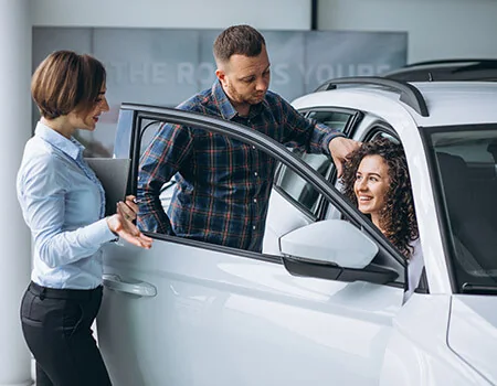A rental professional helping customers